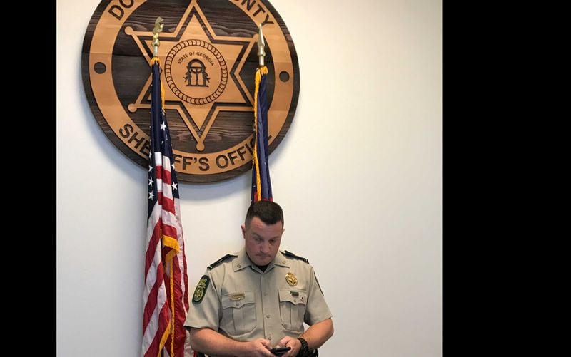 Sgt. Jesse Hambrick of the Douglas County Sheriff's Department released information about Jonathan Freeman, a Lithia Springs teacher who shot himself in school.
