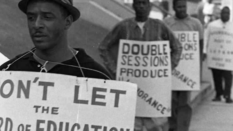 In 1967, African-American parents fought against segregated schools, picketing outside the Atlanta Public Schools offices. CHARLES R. PUGH, JR. / THE ATLANTA JOURNAL-CONSTITUTION