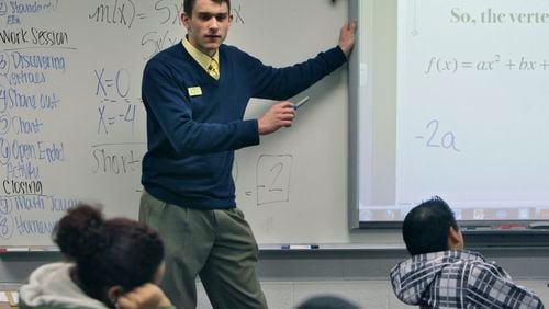 Daniel Keiger, a Kennesaw State University intern, teaches freshman algebra at Osborne High School in Marietta as part of a special training program at KSU.