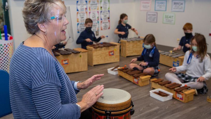 Mrs. Laurie Plate leads her music class at Cornerstone Christian Academy in Peachtree Corners on Monday January 25th, 2021 For a story on the Top Workplace small category. PHIL SKINNER FOR THE ATLANTA JOURNAL-CONSTITUTION.