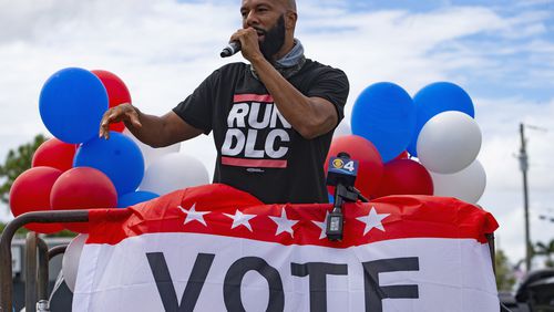 Rapper, actor and writer Common speaks before the Souls to the Polls caravan at The Purple Church, one of many events in Miami prior to the elections, on Sunday, Oct. 25, 2020. (David Santiago/Miami Herald/TNS)