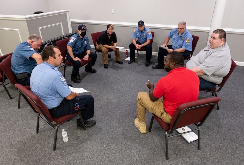 Peer counselors from the Office of Public Safety Support will provide nine more certification training programs across the state over the next six months. Ben Gray for the Atlanta Journal-Constitution