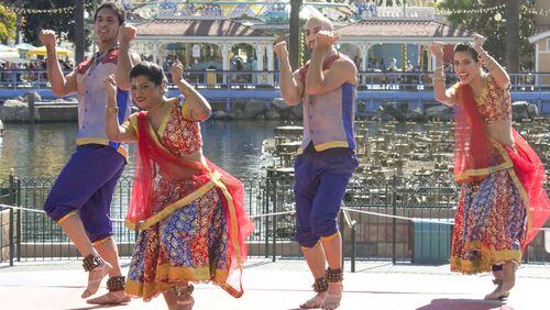 The Blue13 Dance Company perform traditional Indian dances with a Bollywood style as a salute to Dawali, the Eastern Festival of Lights during the “Festival of Holidays” at Disney California Adventure, in Anaheim, Calif., on November 10, 2016. (Mark Eades/Orange County Register/TNS)