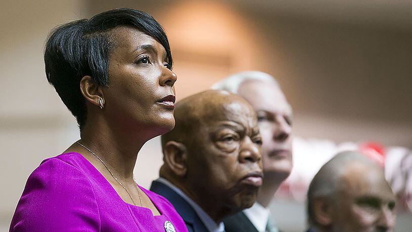 04/08/2019 — Atlanta, Georgia — Atlanta Mayor Keisha Lance Bottoms (left) sits with U.S. Congressman John Lewis (second from left) during a tribute to Congressman John Lewis in the atrium of the domestic terminal at Atlanta’s Hartsfield Jackson International Airport, Monday, April 8, 2019. The art exhibit “John Lewis-Good Trouble” was unveiled Monday with historical artifacts, audio and visual installations and tributes to the congressman.