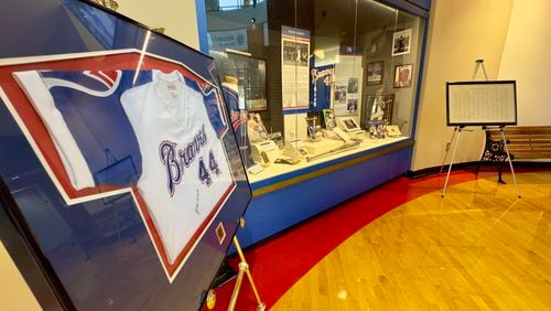 An exhibit marking the 50th anniversary of Hank Aaron's record-breaking 715th home run is on display through July at the Georgia Sports Hall of Fame in Macon. (Joe Kovac Jr. / AJC)