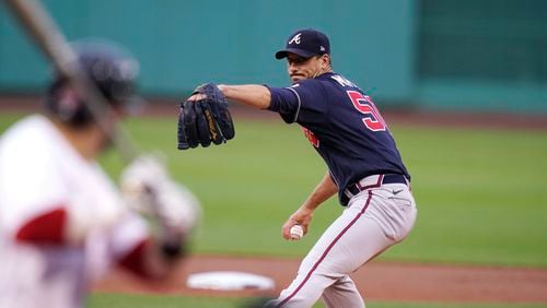 Atlanta Braves starting pitcher Charlie Morton delivers during the first inning of the team's baseball game against the Boston Red Sox at Fenway Park, Tuesday, May 25, 2021, in Boston. (AP Photo/Charles Krupa)