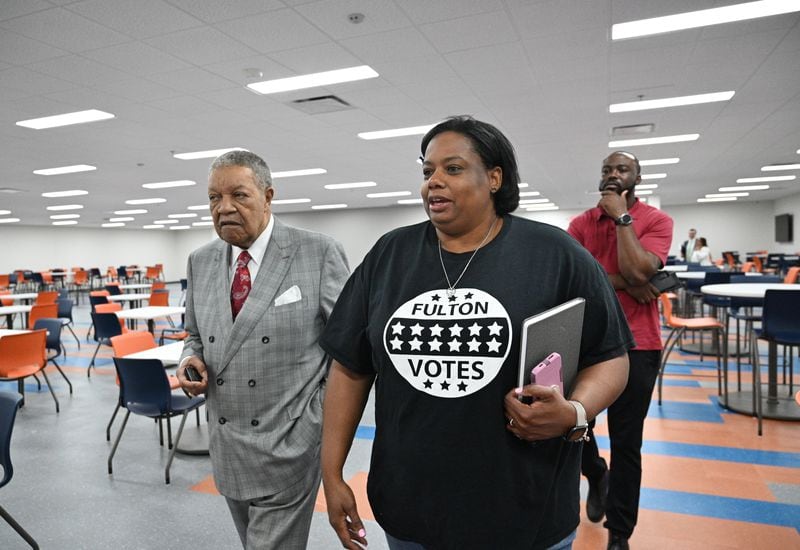 Nadine Williams (right), interim Director of Registration and Elections, talks with Robb Pitts, Chairman of Fulton County Board of Commissioners, at new Fulton County Election Hub and Operation Center, Tuesday, July 11, 2023, in Fairburn. (Hyosub Shin / Hyosub.Shin@ajc.com)