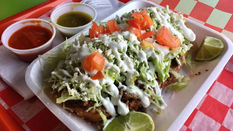 A huarache at Tortas Factory del D.F. is a massive, filling dish of masa, beans and steak for only $2.50. CONTRIBUTED BY WYATT WILLIAMS