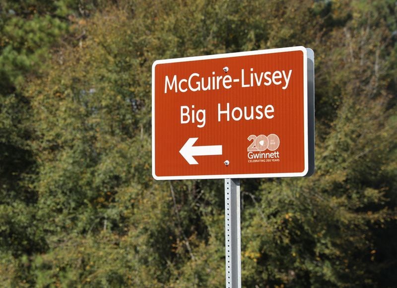 October 31, 2018 - Snellville, Ga: A sign for the Maguire-Livsey Big Home is shown Wednesday, October 31, 2018, in Snellville, Ga. This home also known as the “Big House” was recently purchased by Gwinnett County for renovation and preservation from descendants of the original black owners. (JASON GETZ/SPECIAL TO THE AJC)