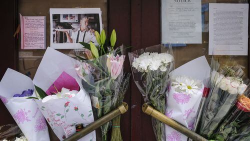 NEW YORK, NY - JUNE 8: Notes, photographs and flowers are left in memory of Anthony Bourdain at the closed location of Brasserie Les Halles, where Bourdain used to work as the executive chef, June 8, 2018 in New York City. Bourdain, a writer, chef and television personality, was found dead in his hotel room in France on Friday. His employer CNN confirmed the death as a suicide. (Photo by Drew Angerer/Getty Images)