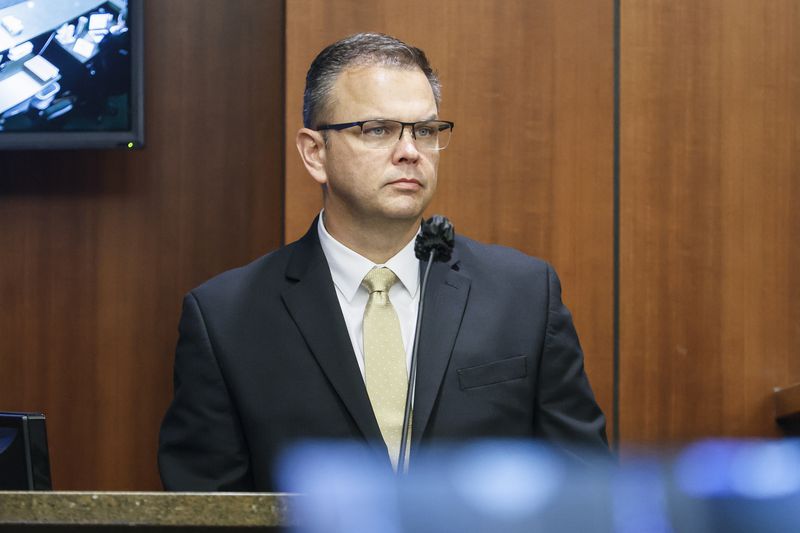 Court of Appeals Judge Christian Coomer takes the stand on day one of his trial for alleged ethic violations at Cobb County Superior Court on Monday, October 17, 2022. (Natrice Miller/natrice.miller@ajc.com)  


