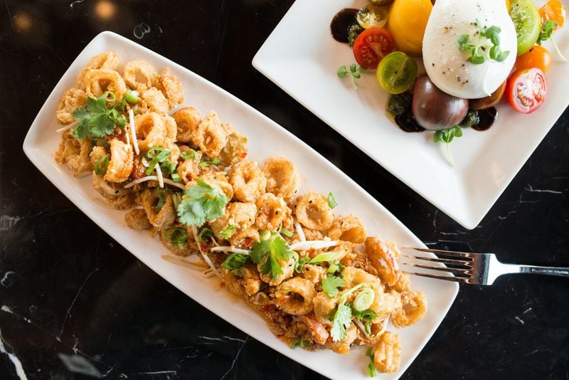 Shanghai-Style Fried Calamari with sweet chili glaze, bean sprouts, cherry peppers, crushed peanuts and scallions. Photo credit- Mia Yakel.