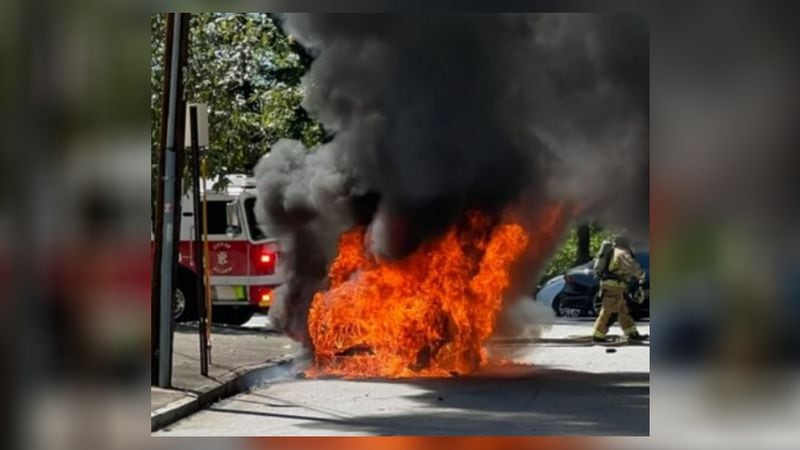 The vehicle along Peachtree Road was engulfed in flames.