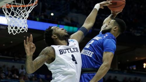 Butler’s Tyler Wideman fouls Middle Tennessee State’s Antwain Johnson as he goes up for a shot during the first half of an NCAA tournament second-round game on Saturday, March 18, 2017, in Milwaukee. (AP Photo/Morry Gash)