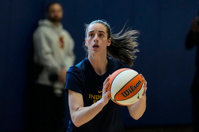 Indiana Fever guard Caitlin Clark looks to shoot as the WNBA basketball team practices in Indianapolis, Sunday, April 28, 2024. (AP Photo/Michael Conroy)