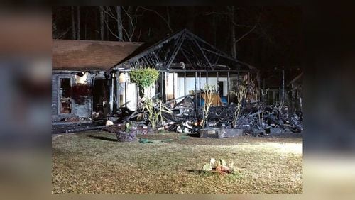 A Christmas Day house fire in DeKalb County left three people hospitalized, authorities said.