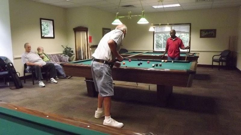 Shooting pool is a popular pastime at the Cobb Wellness Center in Marietta. Beginning in February, Cobb seniors will be required to purchase an annual membership to use the senior centers. Certain classes, activities and trips will be charged additional fees. 