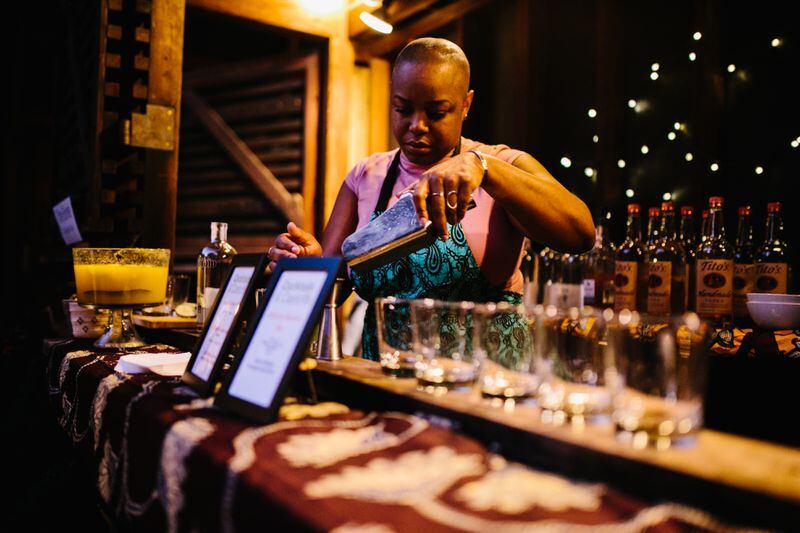 Mixologist Tiffanie Barriere creates drinks for Cocktails & Castoffs, a fundraising event for Development in Gardening (DIG). Atlanta chefs create dishes and beverages inspired by produce grown in DIG's gardens in Africa.
