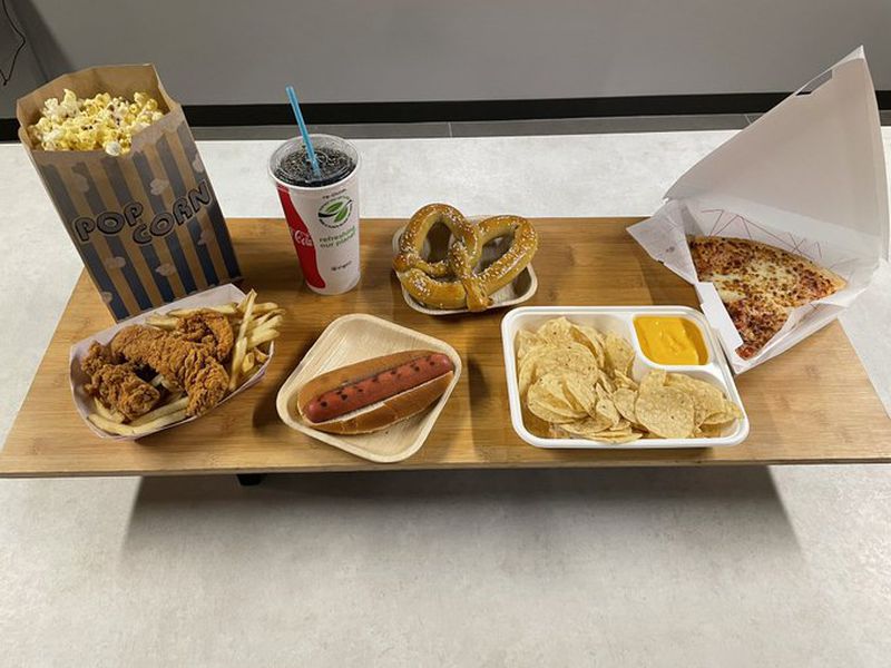 For $20, a family can purchase a slice of pizza, a hot dog, a Bavarian pretzel, popcorn, nachos with cheese, chicken tenders and fries and a refillable soda at the Mercedes-Benz Stadium.