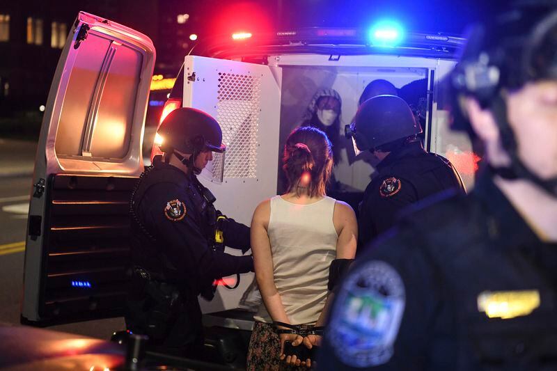 A pro- Palestinian demonstrator is arrested by the University of Tennessee police department in Knoxville, Tenn., Thursday, May 2, 2024. (Hannah Mattix/Knoxville News Sentinel via AP)