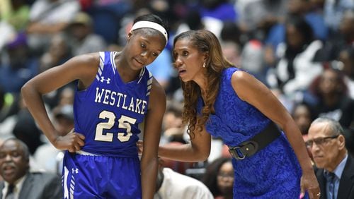 Westlake head coach Hilda Hankerson instructs Raven Johnson (25) in the GHSA Class AAAAAAA championship game Saturday, March 9, 2019, at the Macon Centreplex in Macon.