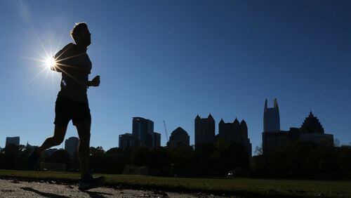 A runner takes a few laps at the Active Oval in Piedmont Park.