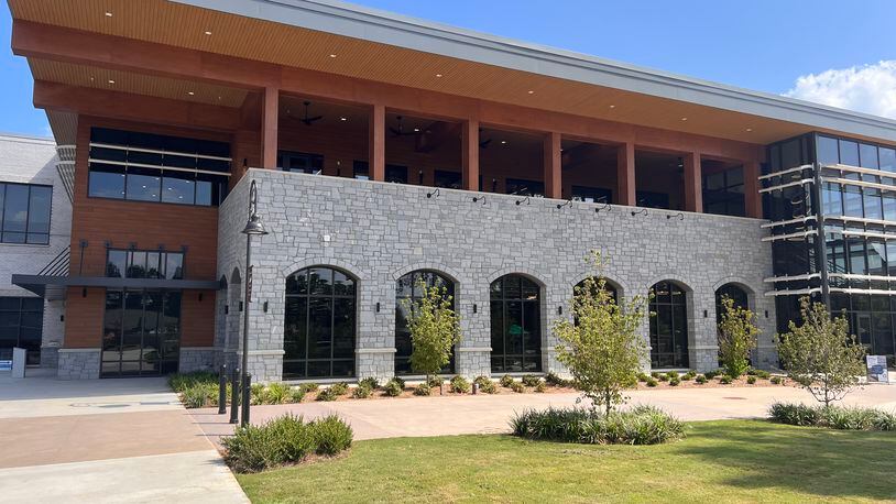 One Snellville resident is already taking advantage of Gwinnett County’s new library branch. Elizabeth H. Williams, which officially opened on Monday as a part of Snellville’s growing mixed-use development, The Grove.