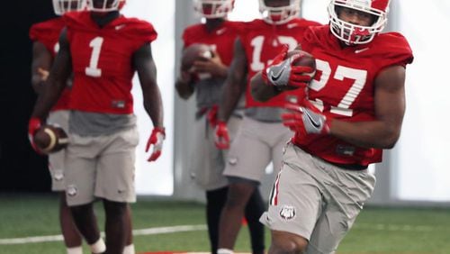 Georgia Bulldogs running back Nick Chubb, No. 27 during practice in Athens Saturday. AJC photo: Bob Andres