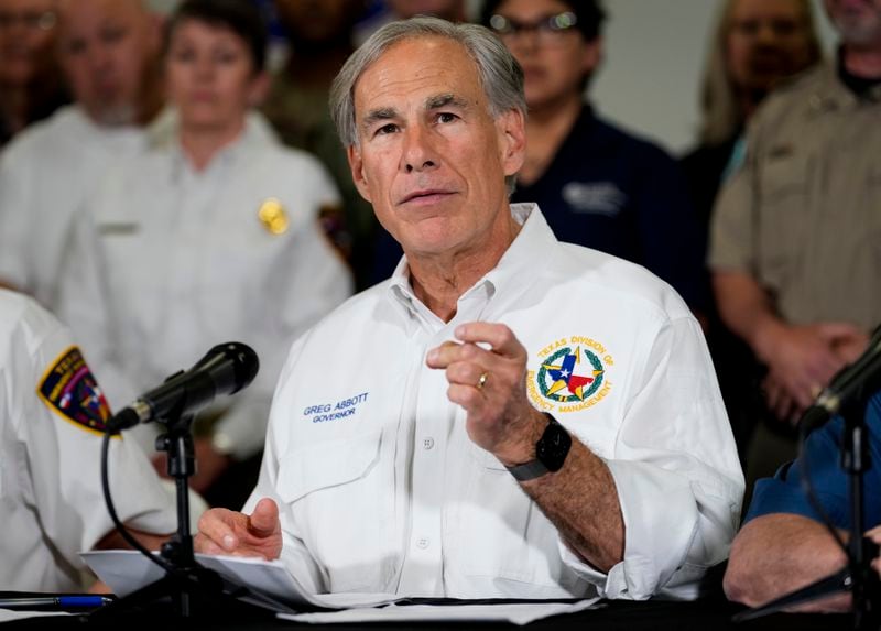 Texas Gov. Greg Abbott updates the state's ongoing response to severe weather and flooding conditions that impacted East Texas communities during a press conference, Monday, May 6, 2024, at Montgomery County Office of Emergency Management Warehouse in Conroe, Texas. Abbott urged people whose properties are damaged to report to the state government as soon as they can. (Yi-Chin Lee/Houston Chronicle via AP)