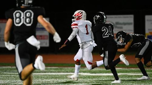 Milton's Devin Farrell rushed for 120 yards and added 133 yards passing in a 2020 game against Alpharetta.