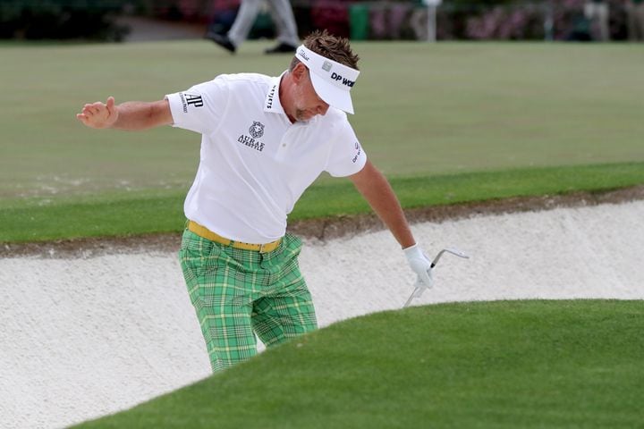 April 9, 2021, Augusta: Ian Poulter reacts to his bunker shot to the fifteenth green during the second round of the Masters at Augusta National Golf Club on Friday, April 9, 2021, in Augusta. Curtis Compton/ccompton@ajc.com