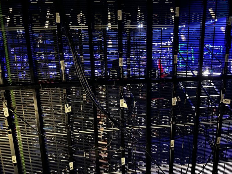 Wires run between sections of light on one of the individual screens behind the stage of the Sphere on Tuesday, April 16, 2024, in Las Vegas. (AP Photo/Josh Cornfield)