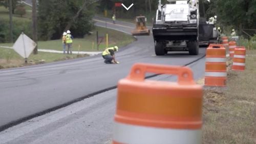 Sandy Springs road crews are ready for a break in the rain to repair potholes. AJC/File PHOTO COURTESY Baldwin Paving (Courtesy Baldwin Paving)