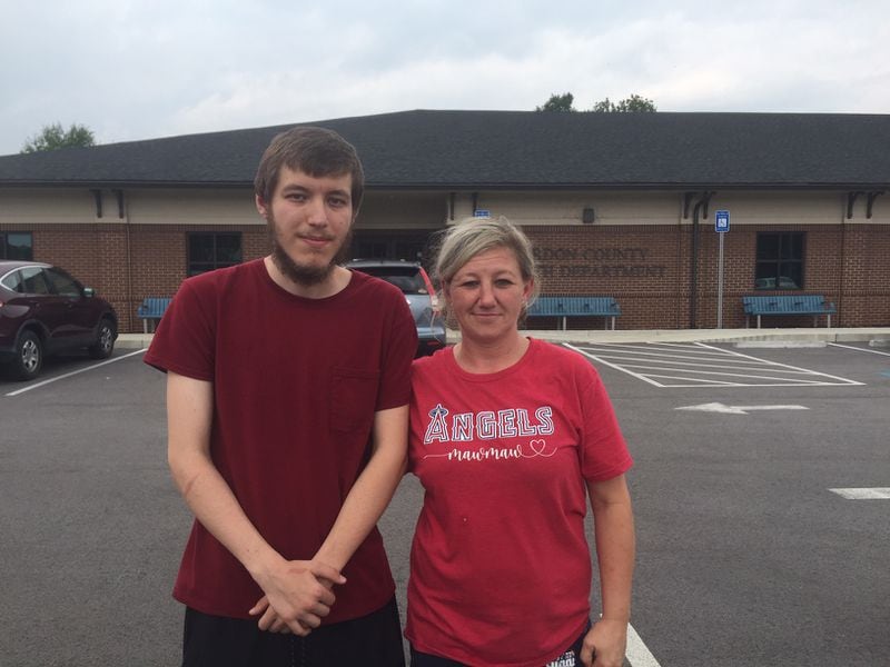 Amie Chitwood, of Calhoun, met her 23-year-old son, Gene Patterson, at the Gordon County Health Department on Tuesday, Aug. 3, 2021, and watched him get his first shot of the Moderna vaccine. “I worry about my grandchildren going to school right now," Chitwood said. "They’re too young (to get the shots).” Patterson added, “I just don’t like going out of my way for things.” (Johnny Edwards / Johnny.Edwards@ajc.com)