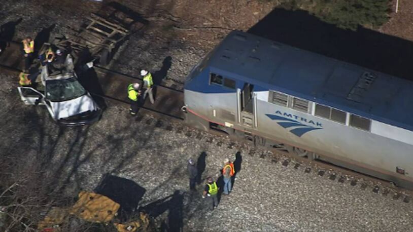 A FedEx driver is dead after a collision with an Amtrak train in Haralson County, according to authorities.