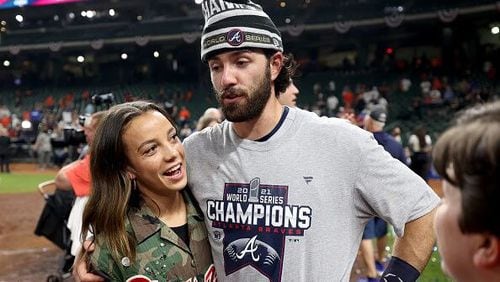 Dansby Swanson is expected to play in Chicago, where his new bride Mallory (left) plays pro soccer.