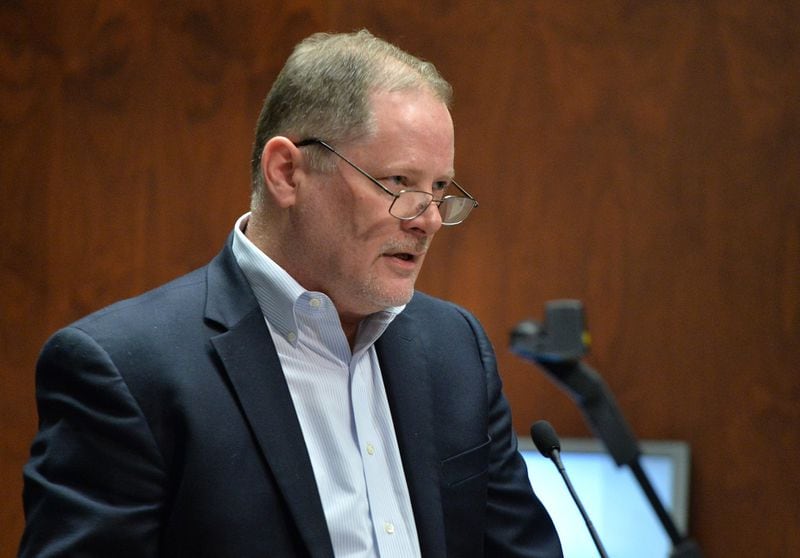 Tom Cheek, a Cobb resident who challenged county officials on the Braves stadium deal, is shown during a Cobb County Commission ethics board hearing in 2014. (HYOSUB SHIN / HSHIN@AJC.COM)