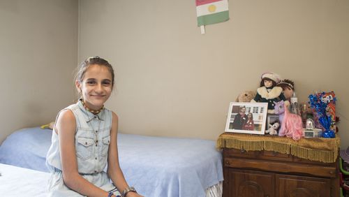 Now 12 years old, Nawroz is thriving in Georgia. A straight-A student quickly mastering English, she was recently admitted to a prestigious independent school in Atlanta. She wants to become a doctor. Chad Rhym/ Chad.Rhym@ajc.com