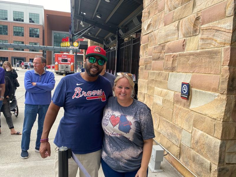 Matt Johnson and Kim Barnes stood in line outside the Clubhouse Store Sunday in anticipation of buying Atlanta Braves gear when they went inside. Photo: Adrianne Murchison.