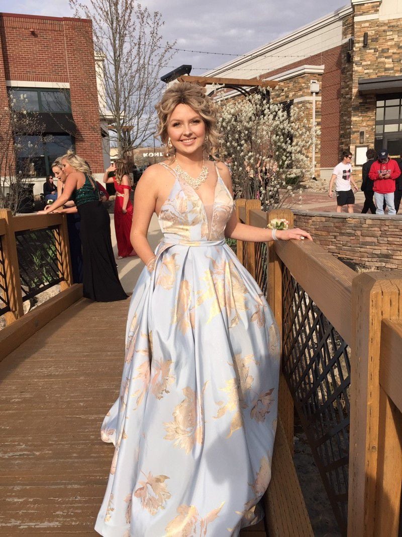 Despite the chemotherapy treatments, Mattie Cole went to her high school prom Saturday night. She wore a wig for part of the evening, then took it off when it got hot and itchy, her mother said.