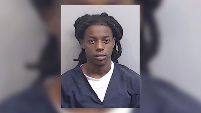 LeParis Dade, 24, also known as OMB Peezy, was booked into the Fulton County Jail on charges of aggravated assault with a deadly weapon and possession of a firearm during the commission of a crime.