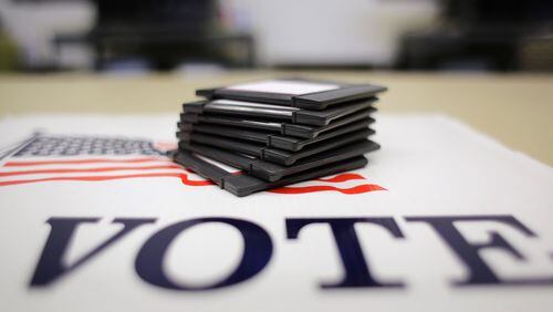 Residents in two new cities, South Fulton and Stonecrest, will cast ballots today for their first mayors and council members as voters across metro Atlanta go to the polls for local elections. (AP Photo/Eric Gay)