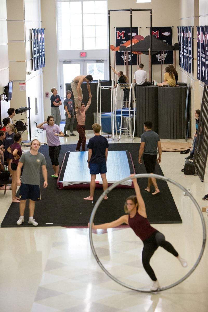 Students practice their various routines in a large hallway at Milton High School. (Photo by Phil Skinner)