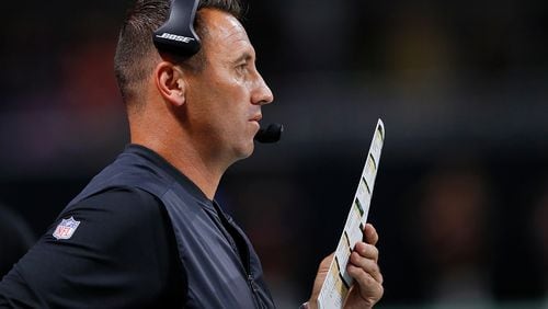 Falcons offensive coordinator Steve Sarkisian calls plays from the sidelines at Mercedes-Benz Stadium.