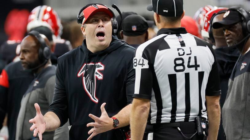 Falcons head coach Arthur Smiths reacts with a referee after a play during the fourth quarter against the Steelers at Mercedes-Benz Stadium on Sunday, December 4, 2022. Miguel Martinez / miguel.martinezjimenez@ajc.com