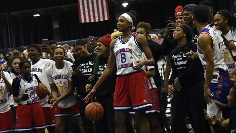 Maya Dodson gets encouragement before attempting to dunk during the 2017 McDonald's All American games POWERADE Jam Fest on March 27,  2017,  in Chicago.