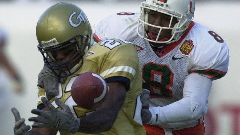 Miami's Mike Rumph disrupts a pass for Georgia Tech's Dez White in the fourth quarter in the Gator Bowl on Jan 1, 2000.