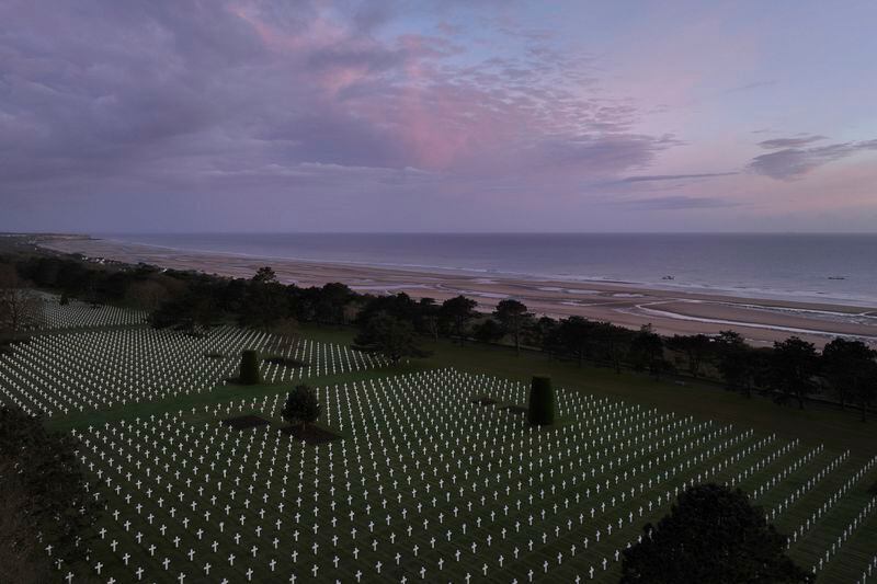 This photo taken on Wednesday April 10, 2024, shows crosses of the US cemetery of Colleville-sur-Mer, Normandy. On D-Day, Charles Shay was a 19-year-old Native American army medic who was ready to give his life — and actually saved many. Now 99, he's spreading a message of peace with tireless dedication as he's about to take part in the 80th celebrations of the landings in Normandy that led to the liberation of France and Europe from Nazi Germany occupation. (AP Photo/Thibault Camus)