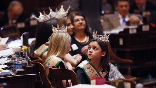 3/15/18 - Atlanta - Tiny Miss Georgia Peach, Adyson Ricketson of Albany, waits in the well for her turn to be recognized along with the rest of the Georgia Peach court, as the Peach was honored as the "Queen of fruit" during an invite resolution.   BOB ANDRES  /BANDRES@AJC.COM