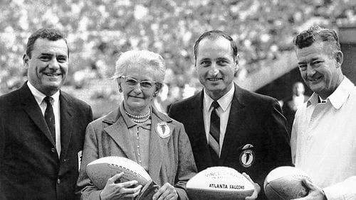 Then-Falcons owner Rankin Smith, Julia Elliott, then-Georgia coach Vince Dooley and then-Atlanta Constitution sports editor Jesse Outlar before a game in 1966. Elliott, a school teacher in Griffin, suggested Falcons as the team’s nickname.